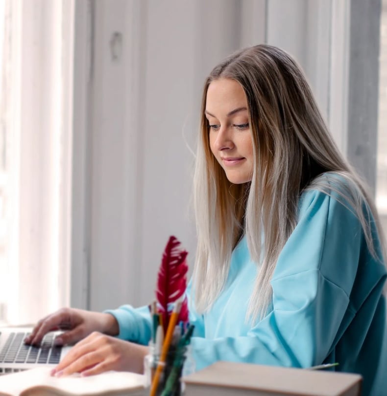 A beautiful lady researching about how to get a driving licence in Germany